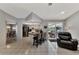 Updated kitchen with white cabinets, breakfast bar, and access to the pool area at 1567 Waterford Dr, Venice, FL 34292