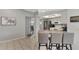 Modern kitchen with stainless steel appliances and an island at 1567 Waterford Dr, Venice, FL 34292