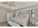 Bright bedroom with a king-size bed and ample closet space at 1567 Waterford Dr, Venice, FL 34292
