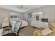 Cozy bedroom with a queen-size bed and home office space at 1567 Waterford Dr, Venice, FL 34292