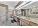 Elegant bathroom with dual sinks, a soaking tub, and a separate shower at 1567 Waterford Dr, Venice, FL 34292