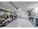 Spacious garage with golf cart, workbench, and ample storage at 536 Riviera St, Venice, FL 34285