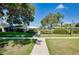 Inviting walkway leading to the community pool area at 1350 Stafford Ln # 1422, Sarasota, FL 34232