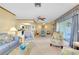 Open concept living space with a view into the kitchen and dining area at 1350 Stafford Ln # 1422, Sarasota, FL 34232