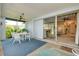 Screened porch with access to living room, offering extra living space at 1350 Stafford Ln # 1422, Sarasota, FL 34232