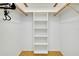 Spacious closet with built-in shelving at 1350 Stafford Ln # 1422, Sarasota, FL 34232