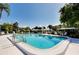 Inviting community pool with ample lounge chairs at 1350 Stafford Ln # 1422, Sarasota, FL 34232