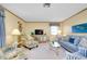 Spacious living room boasts ample natural light and comfortable furnishings at 1350 Stafford Ln # 1422, Sarasota, FL 34232