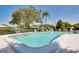 Refreshing community pool with ample lounge chairs at 1350 Stafford Ln # 1422, Sarasota, FL 34232