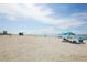 Relaxing beach scene with people enjoying the sun and ocean at 1000 Tarpon Center Dr # 603, Venice, FL 34285