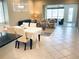 Bright and airy living space featuring an open floor plan, seamless indoor-outdoor flow, and comfortable seating at 334 Melrose Ct, Venice, FL 34292