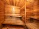 Relaxing wooden sauna with built-in benches at 257 Palm Harbor Dr, North Port, FL 34287