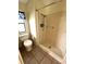Bathroom with shower and tile flooring at 257 Palm Harbor Dr, North Port, FL 34287