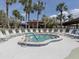 Inviting outdoor hot tub surrounded by lounge chairs at 257 Palm Harbor Dr, North Port, FL 34287