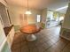 Bright dining area with view into kitchen at 257 Palm Harbor Dr, North Port, FL 34287