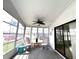 Relaxing sunroom with rocking chairs and ample natural light at 257 Palm Harbor Dr, North Port, FL 34287