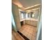 Bathroom with double vanity and tiled floor at 257 Palm Harbor Dr, North Port, FL 34287
