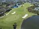 Aerial view of a scenic golf course at 688 Back Nine Dr, Venice, FL 34285