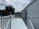 View from the deck shows surrounding neighborhood at 923 Cortina Blvd, Venice, FL 34285