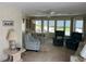 Dining area with table, chairs, and access to living room at 923 Cortina Blvd, Venice, FL 34285