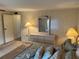 Bedroom with a dresser and queen-size bed at 923 Cortina Blvd, Venice, FL 34285