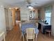 Dining area features a table for four and built-in hutch at 923 Cortina Blvd, Venice, FL 34285