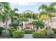Inviting condo complex with lush tropical landscaping and well-maintained grounds at 4240 Central Sarasota Pkwy # 616, Sarasota, FL 34238