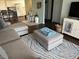 Bright living room boasts wood floors, cozy furniture, and a stylish decor at 4240 Central Sarasota Pkwy # 616, Sarasota, FL 34238