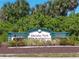 Holiday Park sign at entrance of community at 6502 Hikina Dr, North Port, FL 34287