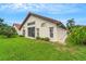 Well maintained house exterior with tile roof and landscaping at 1188 Harbor Town Way, Venice, FL 34292