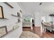 Bright and spacious entryway with wood flooring and built-in shelves at 1188 Harbor Town Way, Venice, FL 34292