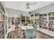 Quiet community library with bookshelves and a small reading area at 1188 Harbor Town Way, Venice, FL 34292