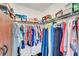 Large walk-in closet with ample shelving and hanging space at 1188 Harbor Town Way, Venice, FL 34292
