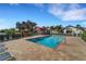Relaxing community pool with patio and lounge chairs at 1188 Harbor Town Way, Venice, FL 34292