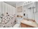 Simple bathroom with shower/tub combo and floral curtain at 1188 Harbor Town Way, Venice, FL 34292