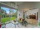 Bright and airy sunroom with access to the backyard and pool at 1188 Harbor Town Way, Venice, FL 34292
