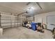 Attached garage with space for golf cart and additional storage at 1188 Harbor Town Way, Venice, FL 34292