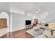 Open living space featuring hardwood floors and comfortable seating at 1188 Harbor Town Way, Venice, FL 34292