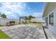 Spacious backyard patio with pavers, grill, and seating area at 8509 La Boca Ave, North Port, FL 34287