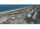 Aerial view of coastal community, beach, and parking areas at 8509 La Boca Ave, North Port, FL 34287