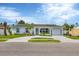 Ranch style home with landscaped yard at 8509 La Boca Ave, North Port, FL 34287