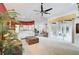 Bright and airy living room with access to the pool area at 4376 Corso Venetia Blvd, Venice, FL 34293