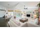 Open living area with a view of the pool and a dining nook at 4376 Corso Venetia Blvd, Venice, FL 34293