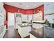Spacious kitchen with white cabinets, granite counters, and island at 4376 Corso Venetia Blvd, Venice, FL 34293