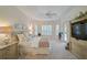 Large main bedroom with king-size bed and plenty of natural light at 4376 Corso Venetia Blvd, Venice, FL 34293