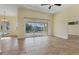 Spacious Gathering room with sliding glass doors to the pool and patio at 233 Fairway Rd, Rotonda West, FL 33947