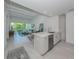 Open concept kitchen with island and stainless steel appliances at 332 Cocoanut Ave # 503, Sarasota, FL 34236