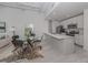 Modern kitchen with stainless steel appliances and an island at 332 Cocoanut Ave # 503, Sarasota, FL 34236