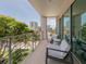 Private balcony with city views and comfortable seating at 332 Cocoanut Ave # 503, Sarasota, FL 34236