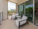 Spacious balcony with comfortable seating and city views at 332 Cocoanut Ave # 503, Sarasota, FL 34236